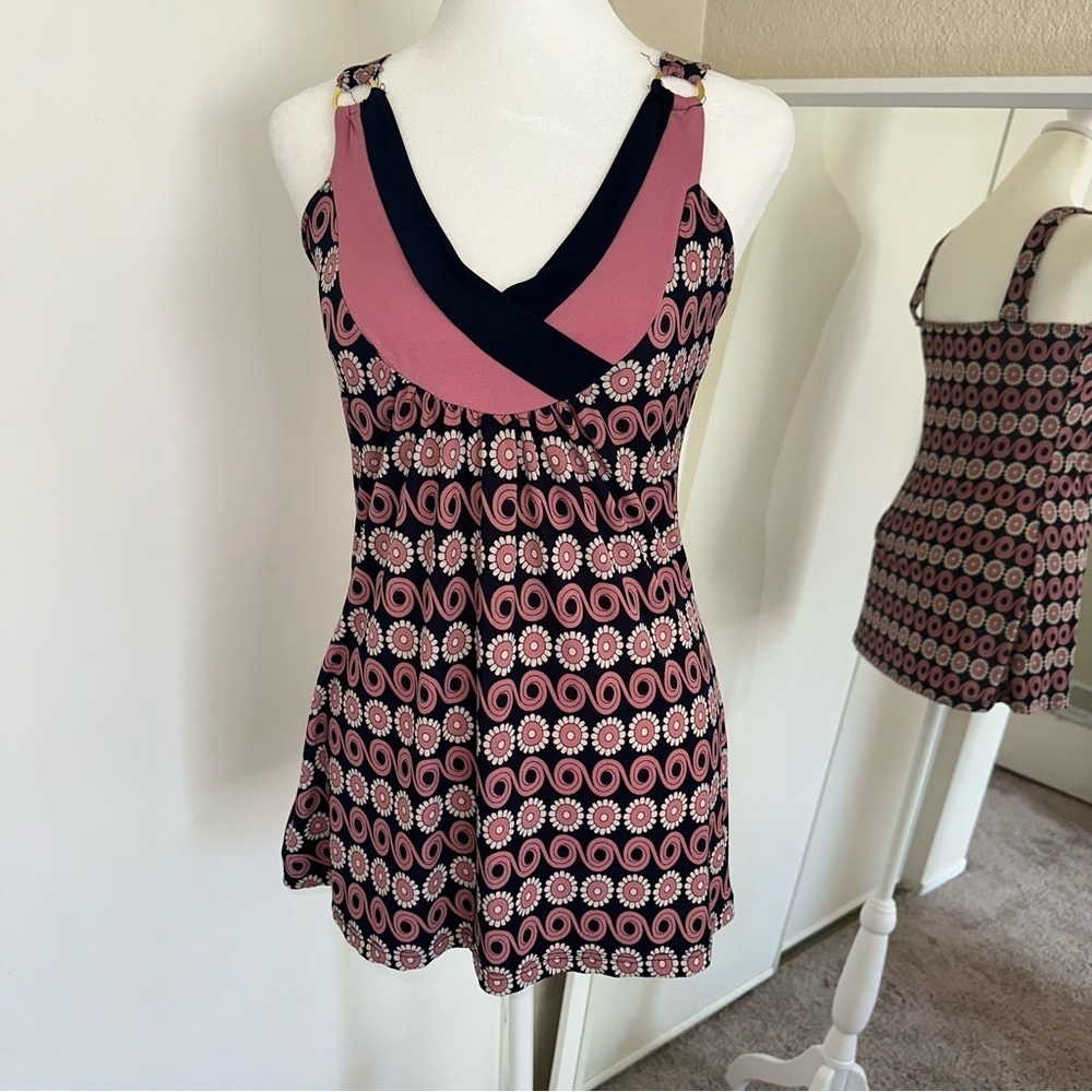 Pink floral babydoll top with ring at the neck size medium